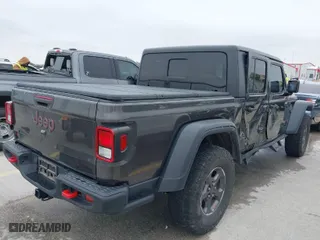2020 Jeep Gladiator Rubicon with VIN 1C6JJTBG8LL135573, listed as a IAAI auction lot 41585896 with 79,070 mi miles. Bid and sale history available at carsss.com. Image 4.