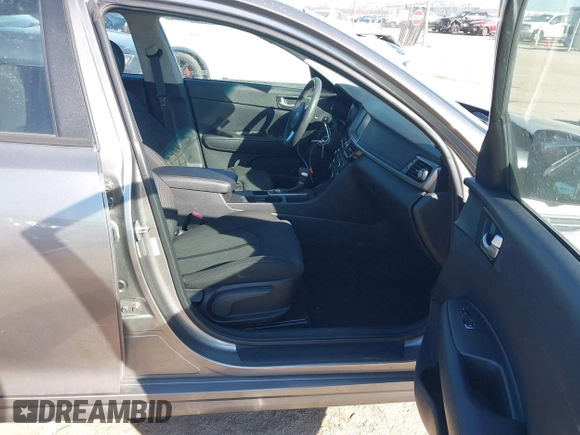 2018 Kia Optima LX with VIN 5XXGT4L32JG254229, listed as a IAAI auction lot 41668531 with 59,892 mi miles. Bid and sale history available at carsss.com. Image 5.