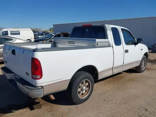1998 Ford F-150 z VIN 1FTZX1726WKB46576, wystawiony jako IAAI lot #41881427 z przebiegiem 168 864 mil mil oraz . Historia ofert i sprzedaży dostępna na DreamBid. Obrazek 4.