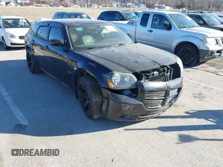 2005 Dodge Magnum RT with VIN 2D4GV58215H587205, listed as a IAAI auction lot 41371767 with 115,534 mi miles. Bid and sale history available at carsss.com. Image 1.