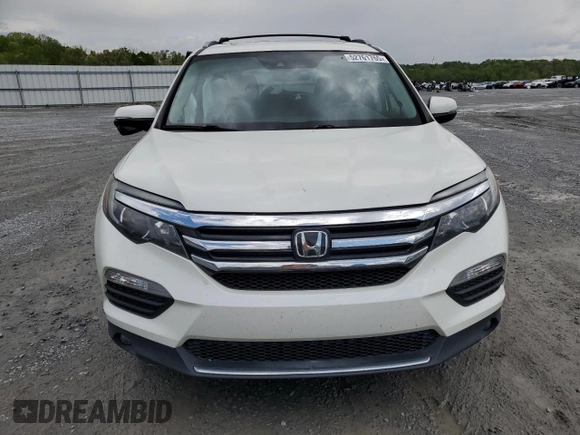 2017 Honda Pilot Touring with VIN 5FNYF6H91HB092062, listed as a Copart auction lot 52761765 with 141,750 mi miles and Salvage Title. Bid and sale history available at DreamBid. Image 5.