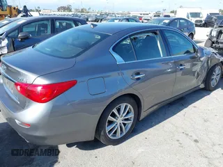 2015 Infiniti Q50 z VIN JN1BV7AP9FM352125, wystawiony jako IAAI lot #42262559 z przebiegiem 51 067 mil mil oraz . Historia ofert i sprzedaży dostępna na DreamBid. Obrazek 4.