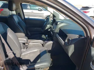 2014 Jeep Compass Sport with VIN 1C4NJCBA4ED880940, listed as a IAAI auction lot 41712357 with 156,171 mi miles. Bid and sale history available at carsss.com. Image 5.