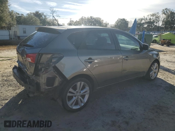 2012 Kia Forte SX с VIN KNAFW5A3XC5518104, выставлен на аукционе Copart как лот 42579785 с пробегом 130 111 миль миль и Списание • Salvage title. История ставок и продаж доступна на DreamBid. Изображение 3.