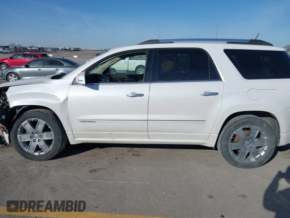 2016 GMC Acadia Denali with VIN 1GKKVTKD3GJ221449, listed as a IAAI auction lot 41777230 with 157,699 mi miles and . Bid and sale history available at DreamBid. Image 14.