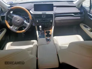 2020 Lexus RX 450h with VIN 2T2HGMDA3LC046646, listed as a Copart auction lot 61030015 with 74,709 mi miles and Salvage title. Bid and sale history available at DreamBid. Image 8.