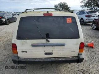 1998 Jeep Cherokee Sport with VIN 1J4FT68S8WL101900, listed as a Copart auction lot 86476444 with 0 mi miles and Salvage Title. Bid and sale history available at carsss.com. Image 6.