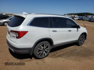 2022 Honda Pilot Touring 7-Passenger z VIN 5FNYF5H66NB025193, wystawiony jako Copart lot #50054505 z przebiegiem 25 650 mil mil oraz Czysty tytuł • Clean title. Historia ofert i sprzedaży dostępna na DreamBid. Obrazek 3.