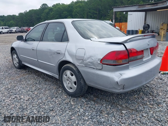 2002 Honda Accord EX z VIN 1HGCG16562A084499, wystawiony jako IAAI lot #42446830 z przebiegiem 241 615 mil mil oraz . Historia ofert i sprzedaży dostępna na DreamBid. Obrazek 3.
