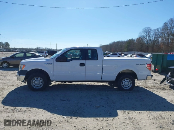 2014 Ford F-150 XL with VIN 1FTFX1EF0EKF01068, listed as a IAAI auction lot 41641910 with 212,728 mi miles. Bid and sale history available at carsss.com. Image 14.