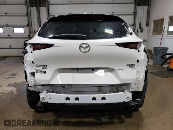 2023 Mazda CX-30 Premium Plus with VIN 3MVDMBEY3PM587798, listed as a Copart auction lot 86524444 with 9,860 mi miles and Salvage title. Bid and sale history available at DreamBid. Image 6.