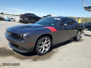 2015 Dodge Challenger SXT Plus with VIN 2C3CDZBG2FH715810, listed as a Copart auction lot 50406185 with 65,920 mi miles and Salvage Title. Bid and sale history available at carsss.com. Image 1.