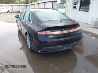 2014 Lincoln MKZ z VIN 3LN6L2G9XER803130, wystawiony jako IAAI lot #42372587 z przebiegiem 84 448 mil mil oraz . Historia ofert i sprzedaży dostępna na DreamBid. Obrazek 3.