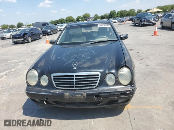 2001 Mercedes-Benz E-Class with VIN WDBJF65J01B225871, listed as a Copart auction lot 66136994 with 2,139,454 mi miles and Clean Title. Bid and sale history available at carsss.com. Image 5.