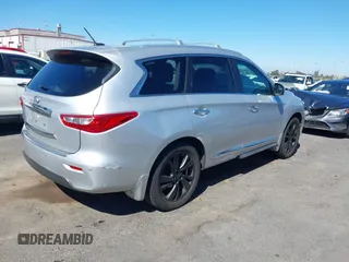 2013 Infiniti JX35 with VIN 5N1AL0MMXDC345352, listed as a IAAI auction lot 40145431 with 105,286 mi miles and . Bid and sale history available at DreamBid. Image 4.