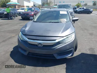 2018 Honda Civic LX with VIN 2HGFC2F57JH546731, listed as a IAAI auction lot 41979976 with 137,531 mi miles. Bid and sale history available at carsss.com. Image 12.