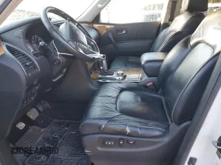 2012 Infiniti QX56 7-passenger with VIN JN8AZ2NE1C9021857, listed as a Copart auction lot 76967164 with 153,958 mi miles and Salvage Title. Bid and sale history available at carsss.com. Image 7.