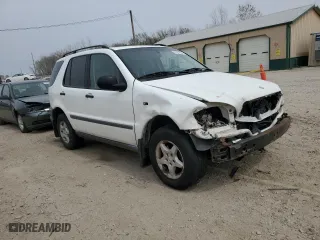 1999 Mercedes-Benz M-Class with VIN 4JGAB54E2XA061500, listed as a Copart auction lot 51301525 with 191,463 mi miles and Salvage Title. Bid and sale history available at carsss.com. Image 4.