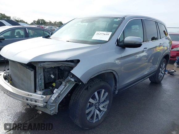 2020 Honda Pilot EX z VIN 5FNYF6H37LB056638, wystawiony jako IAAI lot #41277619 z przebiegiem 62 213 mil mil oraz . Historia ofert i sprzedaży dostępna na DreamBid. Obrazek 20.
