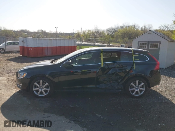 2017 Volvo V60 Premier with VIN YV140MEK5H1349304, listed as a IAAI auction lot 41991653 with 77,439 mi miles and . Bid and sale history available at DreamBid. Image 14.
