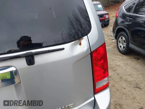 2012 Honda Pilot EX-L with VIN 5FNYF4H5XCB051133, listed as a IAAI auction lot 41907624 with 202,244 mi miles and . Bid and sale history available at carsss.com. Image 6.