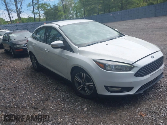 2017 Ford Focus SE with VIN 1FADP3FEXHL233966, listed as a IAAI auction lot 42220832 with 70,197 mi miles and . Bid and sale history available at carsss.com. Image 1.
