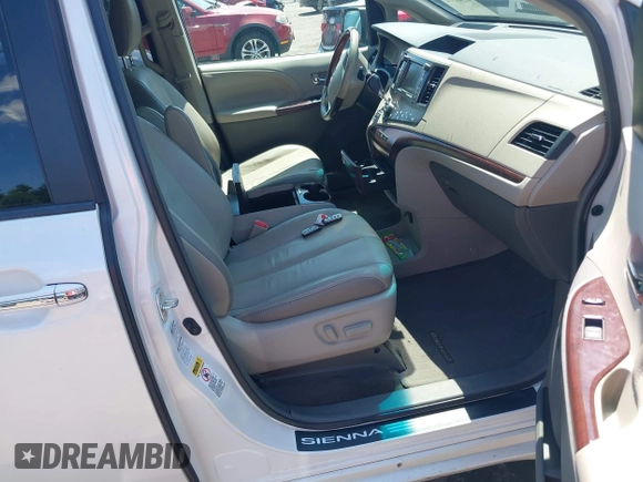 2012 Toyota Sienna XLE with VIN 5TDDK3DC5CS037659, listed as a IAAI auction lot 42541352 with 128,378 mi miles and . Bid and sale history available at DreamBid. Image 5.