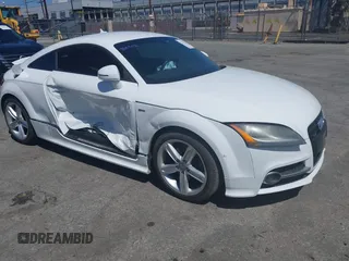 2014 Audi TT 2.0T z VIN TRUBFAFK8E1000731, wystawiony jako IAAI lot #42218318 z przebiegiem 104 325 mil mil oraz . Historia ofert i sprzedaży dostępna na DreamBid. Obrazek 1.
