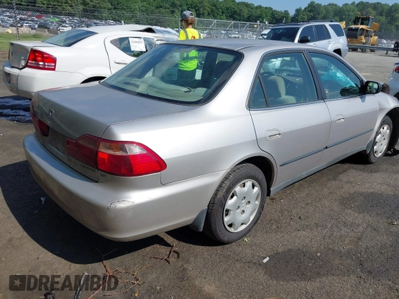 1998 Honda Accord LX with VIN 1HGCG5648WA084802, listed as a IAAI auction lot 42424338 with 201,552 mi miles and . Bid and sale history available at DreamBid. Image 4.