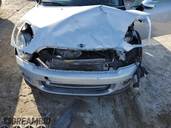 2015 MINI Convertible with VIN WMWZN3C50FT861992, listed as a Copart auction lot 84189754 with Not provided miles and Salvage title. Bid and sale history available at DreamBid. Image 11.