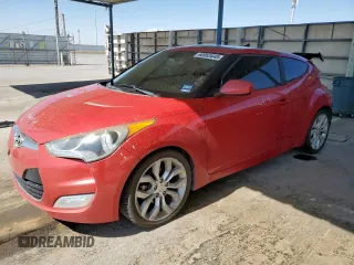 2013 Hyundai Veloster w/Black Int with VIN KMHTC6AD8DU146052, listed as a Copart auction lot 60063445 with 125,193 mi miles and Salvage title. Bid and sale history available at DreamBid. Image 1.