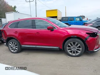 2019 Mazda CX-9 Grand Touring with VIN JM3TCBDY8K0333394, listed as a IAAI auction lot 42109778 with 58,887 mi miles and . Bid and sale history available at DreamBid. Image 14.