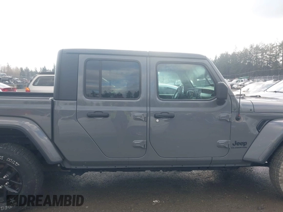 2021 Jeep Gladiator Willys with VIN 1C6HJTAG5ML616706, listed as a IAAI auction lot 41367142 with 50,951 mi miles and . Bid and sale history available at carsss.com. Image 13.