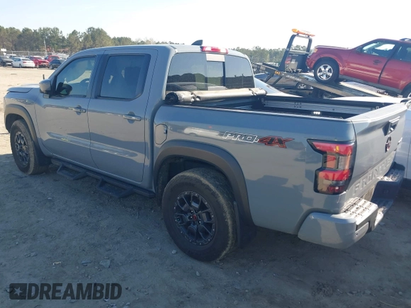 2023 Nissan Frontier Pro-4X with VIN 1N6ED1EK7PN604374, listed as a IAAI auction lot 41828936 with 60,452 mi miles and . Bid and sale history available at DreamBid. Image 3.