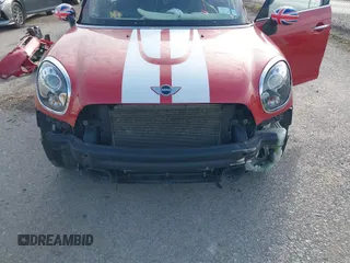 2015 MINI Cooper Countryman S with VIN WMWZC5C51FWP49282, listed as a IAAI auction lot 40698179 with 63,037 mi miles. Bid and sale history available at carsss.com. Image 6.