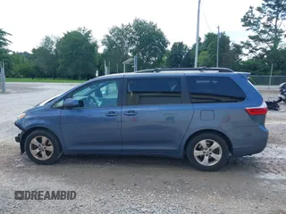 2015 Toyota Sienna LE AAS with VIN 5TDKK3DCXFS624984, listed as a IAAI auction lot 42560632 with 169,034 mi miles and . Bid and sale history available at DreamBid. Image 15.