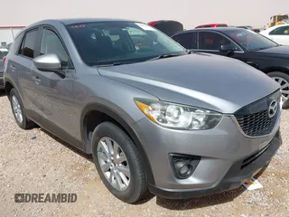 2014 Mazda CX-5 Touring with VIN JM3KE2CY0E0394279, listed as a IAAI auction lot 41813669 with 1 mi miles. Bid and sale history available at carsss.com. Image 1.