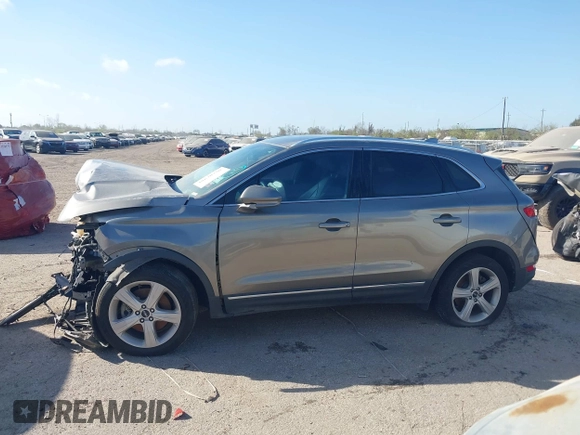 2017 Lincoln MKC Premiere with VIN 5LMCJ1D92HUL71022, listed as a IAAI auction lot 38628790 with 141,930 mi miles. Bid and sale history available at carsss.com. Image 14.
