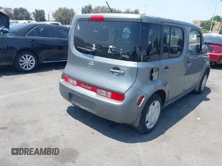 2011 Nissan Cube S z VIN JN8AZ2KR0BT213764, wystawiony jako IAAI lot #42471649 z przebiegiem 180 669 mil mil oraz . Historia ofert i sprzedaży dostępna na DreamBid. Obrazek 4.