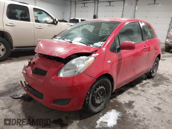 2009 Toyota Yaris with VIN JTDJT903695262292, listed as a IAAI auction lot 41636204 with 157,986 mi miles. Bid and sale history available at carsss.com. Image 17.