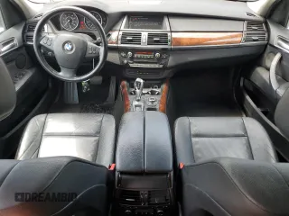 2012 BMW X5 35i with VIN 5UXZV4C50CL991452, listed as a Copart auction lot 56890265 with 147,019 mi miles and Salvage title. Bid and sale history available at DreamBid. Image 8.