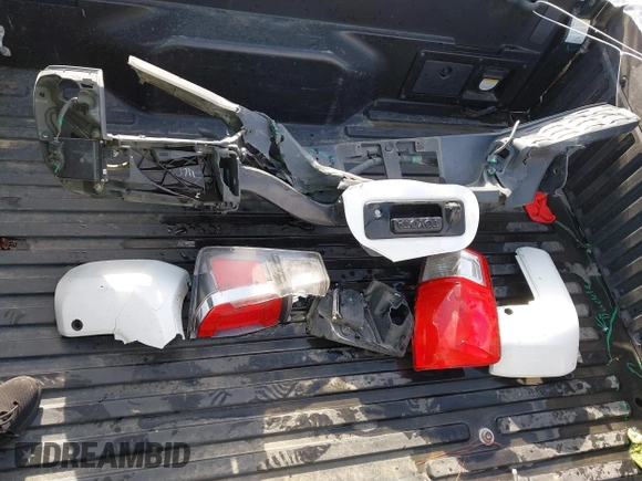 2020 Toyota Tacoma SR5 with VIN 3TMBZ5DN7LM026596, listed as a IAAI auction lot 40705410 with 123,489 mi miles and . Bid and sale history available at DreamBid. Image 12.