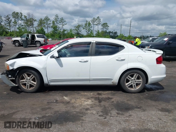 2012 Dodge Avenger SXT with VIN 1C3CDZCB5CN156288, listed as a IAAI auction lot 42115638 with 157,534 mi miles and . Bid and sale history available at DreamBid. Image 14.