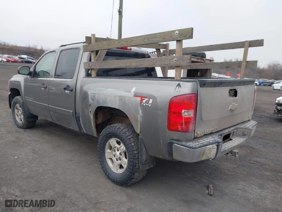 2007 Chevrolet Silverado 1500 LTZ with VIN 2GCEK13M571581790, listed as a IAAI auction lot 41663432 with 184,977 mi miles. Bid and sale history available at carsss.com. Image 3.