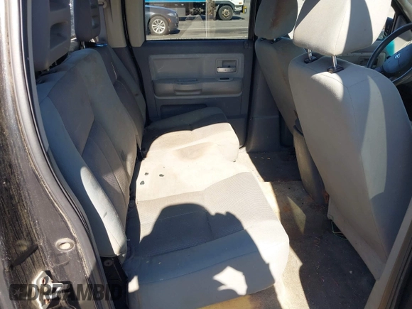 2007 Dodge Dakota SLT z VIN 1D7HW48JX7S196121, wystawiony jako IAAI lot #41863734 z przebiegiem 148 720 mil mil oraz . Historia ofert i sprzedaży dostępna na DreamBid. Obrazek 8.