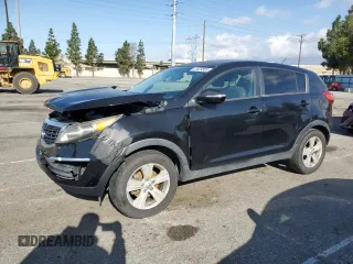 2012 Kia Sportage LX z VIN KNDPB3A21C7345995, wystawiony jako Copart lot #51629505 z przebiegiem 129 255 mil mil oraz Szkoda całkowita • Salvage title. Historia ofert i sprzedaży dostępna na DreamBid. Obrazek 1.