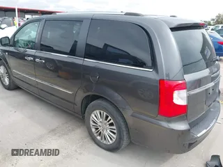2014 Chrysler Town & Country Touring L with VIN 2C4RC1CG7ER300693, listed as a IAAI auction lot 41849463 with 174,203 mi miles and . Bid and sale history available at carsss.com. Image 3.