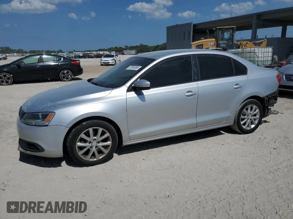2012 Volkswagen Jetta SE с VIN 3VWDX7AJ0CM343712, выставлен на аукционе Copart как лот 57936395 с пробегом 144 698 миль миль и Списание • Salvage title. История ставок и продаж доступна на DreamBid. Изображение 1.