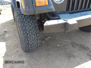 2006 Jeep Wrangler Sport with VIN 1J4FA49S76P718349, listed as a IAAI auction lot 42098356 with 137,804 mi miles and . Bid and sale history available at carsss.com. Image 6.