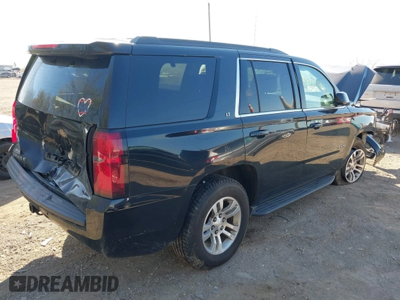 2016 Chevrolet Tahoe LT with VIN 1GNSKBKCXGR393105, listed as a IAAI auction lot 42039456 with 94,417 mi miles and . Bid and sale history available at DreamBid. Image 4.